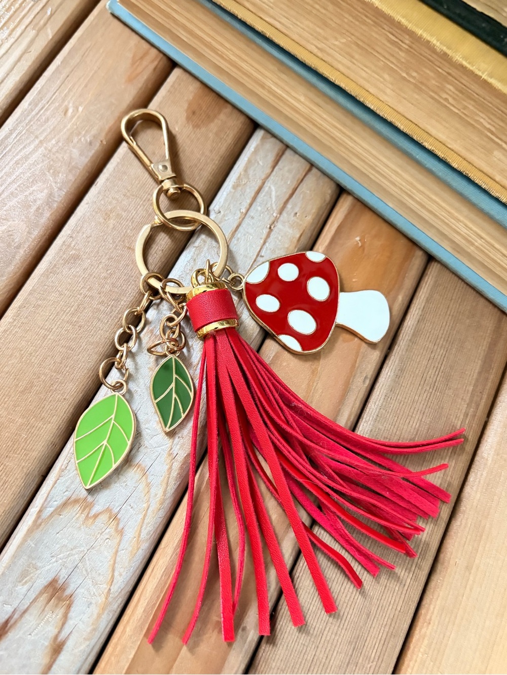 Enameled Mushroom and Leather Tassel Keychain with Green Leaf Charms - Picture 4 of 5